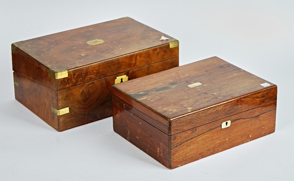 A 19th century rosewood rectangular lift top box, 31cm wide; 12cm high, together with a brass...
