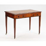 A late Victorian mahogany and figured walnut writing table with a pair of frieze drawers on...