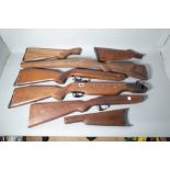 A Barnett Wildcat crossbow stock, six further gun stocks, seven telescopic sights, a quantity...
