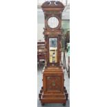 A carved oak and gilt-metal mounted longcase clock