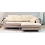 ‘Living Divani’, a modern hardwood framed corner sofa with beige upholstery on chrome tubular...