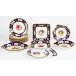 A Royal Worcester part dessert service, circa 1915, each piece painted with an arrangement of...