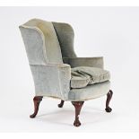 A George II style wingback armchair.