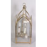 A modern brass and glass hall lantern, 60cm high