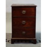 A 19th century mahogany side chest of three short drawers on bracket feet