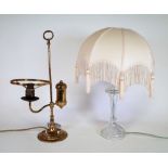 A 20th century brass table lamp in the style of an oil lamp and another glass table lamp (2)