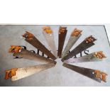 Nine early 20th century hand saws, to include makers, Thomas Turner & Co, Atkins & Co and...