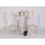 A group of silver plate and glass including; a pair of early 20th century cut glass decanters,...