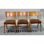 A matched set of five mid-20th century beech bar back dining chairs