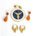 A pair of gold earrings, each in a classical design, with applied decoration, a pair of...