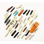 Twenty ivorine handled pocket knives (45)