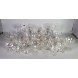 A large quantity of mostly early 20th century drinking glasses (qty)