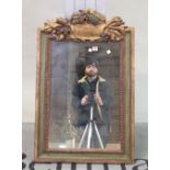 A 19th century Italian green and gilt painted rectangular wall mirror, with cartouche and bull...