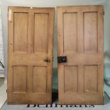 A pair of 18th century internal pine doors, painted on one side