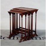 A Regency style mahogany nest of four tables on turned supports