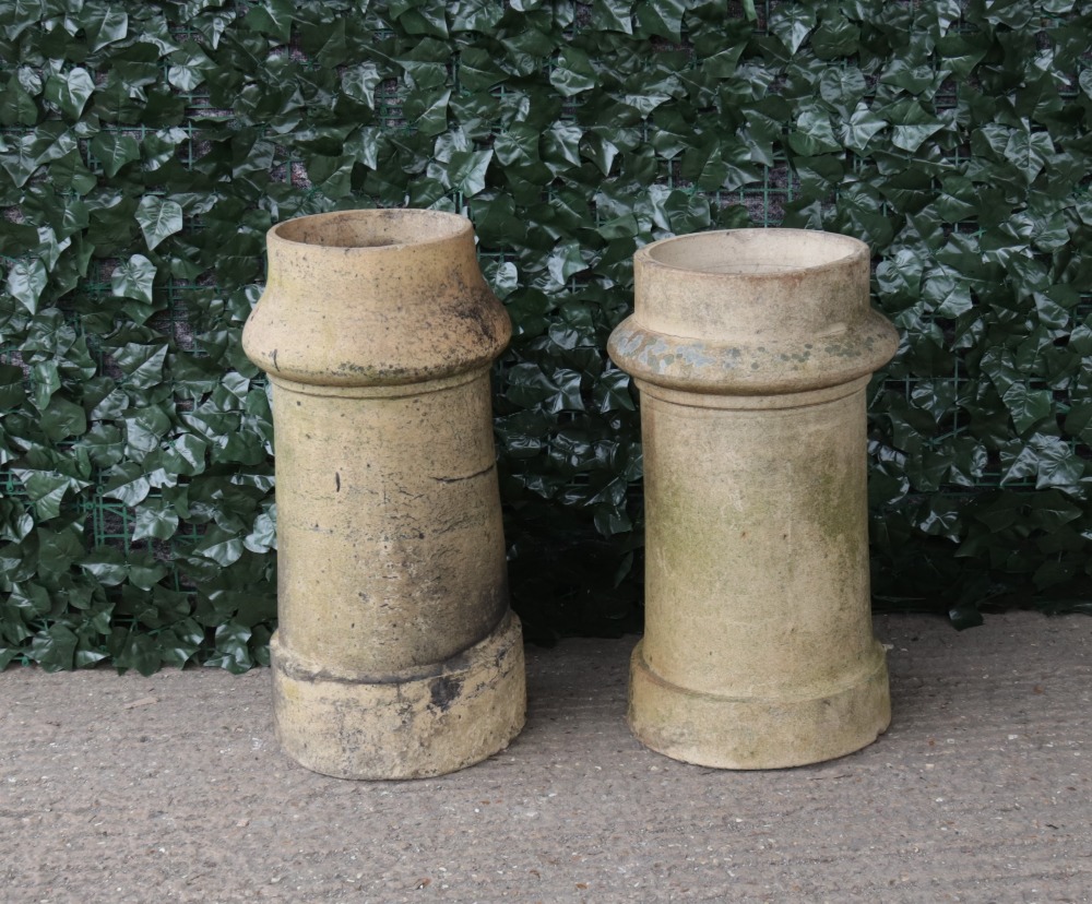 A similar pair of early 20th century terracotta chimney pots, 32cm diameter; 60cm high (2) - Image 2 of 2