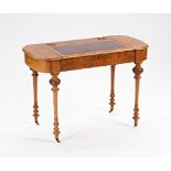 A Victorian figured walnut rounded rectangular writing desk