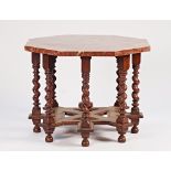 An oak centre table, the marble top, 4cm thick, on eight barley-twist supports united by...