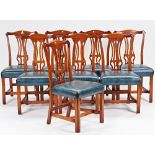 A set of eight George III style oak dining chairs, with pierced splat on square supports, 53cm...