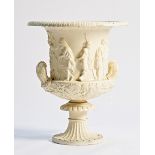 A white painted cast-iron urn