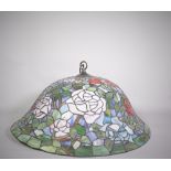 A Tiffany style glass domed ceiling light, decorated with red rose