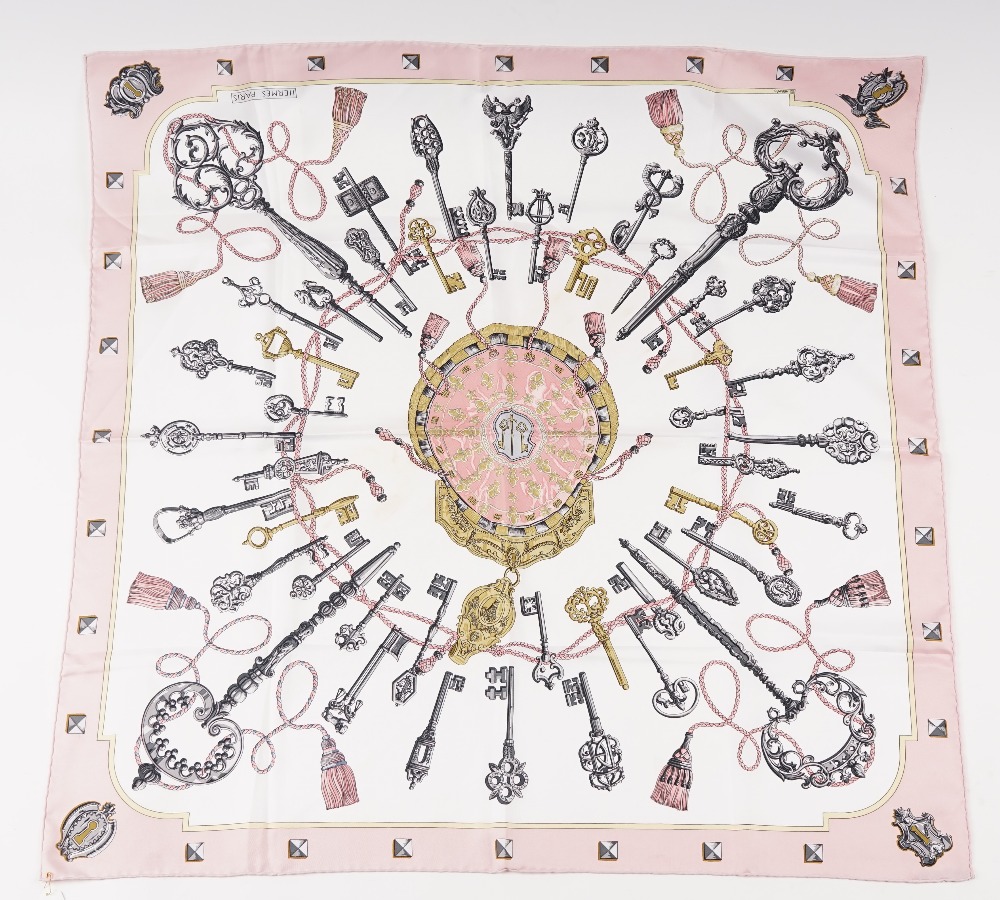 A collection of three Hermes print silk scarves, comprising: a 'Les Parure du Vent' designed... - Image 4 of 5