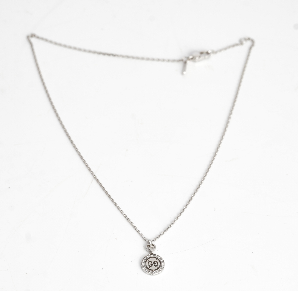 A Gucci white gold and diamond set pendant necklace, the front with a circular drop mounted... - Image 3 of 3