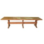 A long 20th century oak refectory dining table