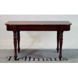 A Regency mahogany 'D' shape console, on reeded baluster supports