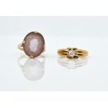 An 18ct gold single stone diamond ring and an amethyst dress ring (2)