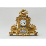 A French gilt-bronze and Sevres style mounted mantel clock