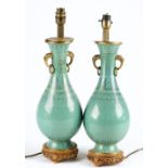 A pair of Chinese green-ground cloisonné vase mounted as lamps