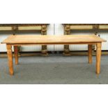 A teak plank top kitchen table