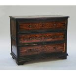 An Italian marquetry inlaid walnut commode