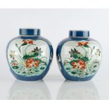 A pair of unusual Chinese porcelain ginger jars and covers