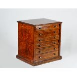 An Edwardian walnut six drawer folio cabinet