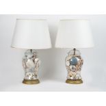 A pair of glass and shell filled baluster table lamps