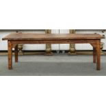 An elm cleated plank top kitchen table