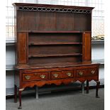 A George III inlaid oak dresser