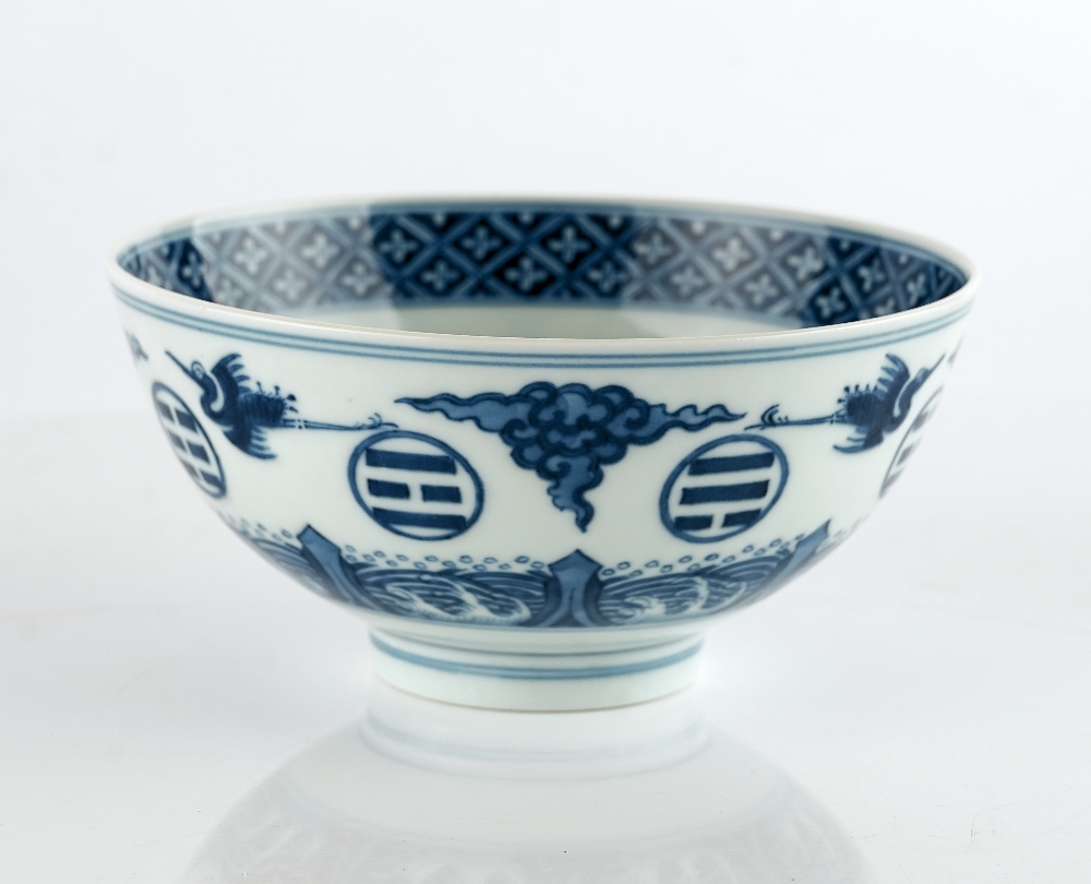 A Chinese blue and white `crane and trigram' bowl