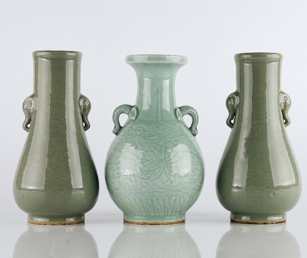 A group of three Chinese carved celadon vases