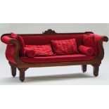 A Regency mahogany framed roll arm sofa