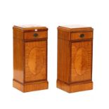 A pair of Edwardian satinwood bed side tables