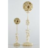 Two Chinese ivory concentric balls on stands