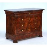 A French figured walnut four drawer commode