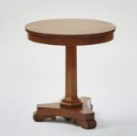 A Regency style pollard oak circular occasional table