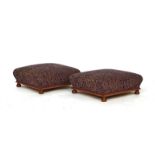 A pair of Victorian mahogany square foot stools