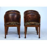 A set of four stained beech tub back chairs