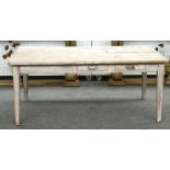 A French Provincial pine painted kitchen table