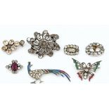 A collection of six brooches and one buckle (7)